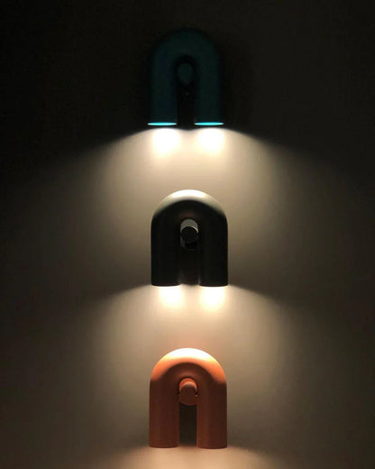 Nowoczesna lampa ścienna LED w kształcie łuku — designerski kinkiet, 4 kolory | Norivo Norivo