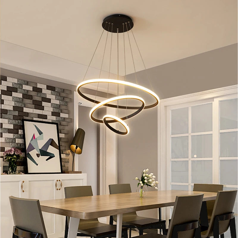 Designerska lampa wisząca LED — żyrandol z formą pierścieni 3D | Norivo Norivo
