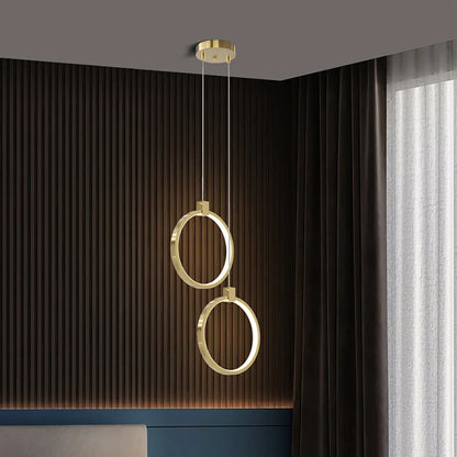 Lampa wisząca LED geometryczna — złoty design | Norivo Norivo