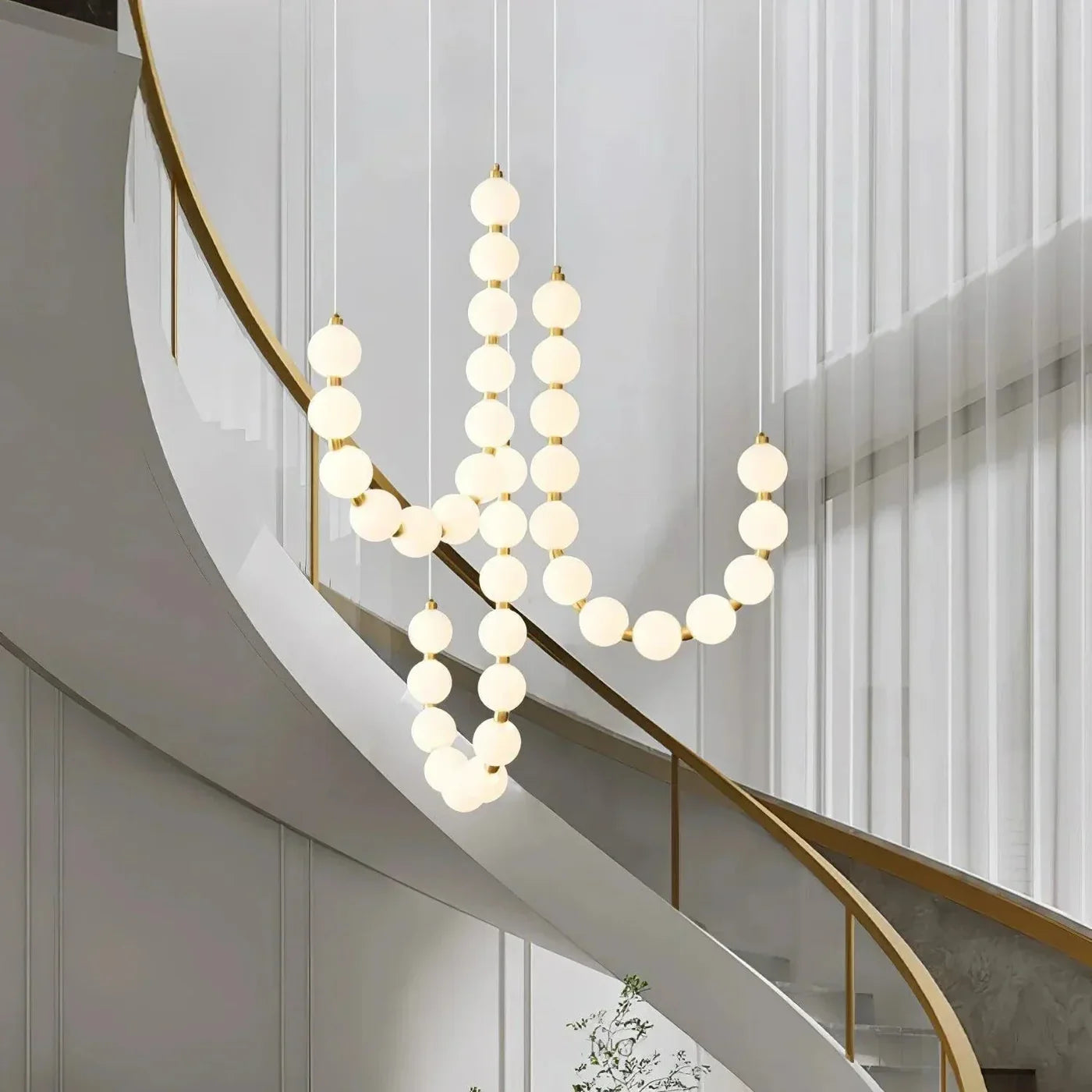 Lampa wisząca LED — efektowna forma naszyjnika z kulami świetlnymi | Norivo Norivo