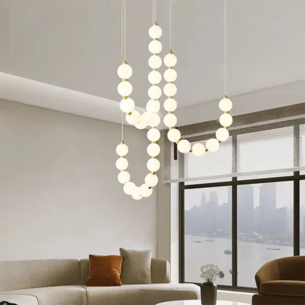 Lampa wisząca LED — efektowna forma naszyjnika z kulami świetlnymi | Norivo Norivo